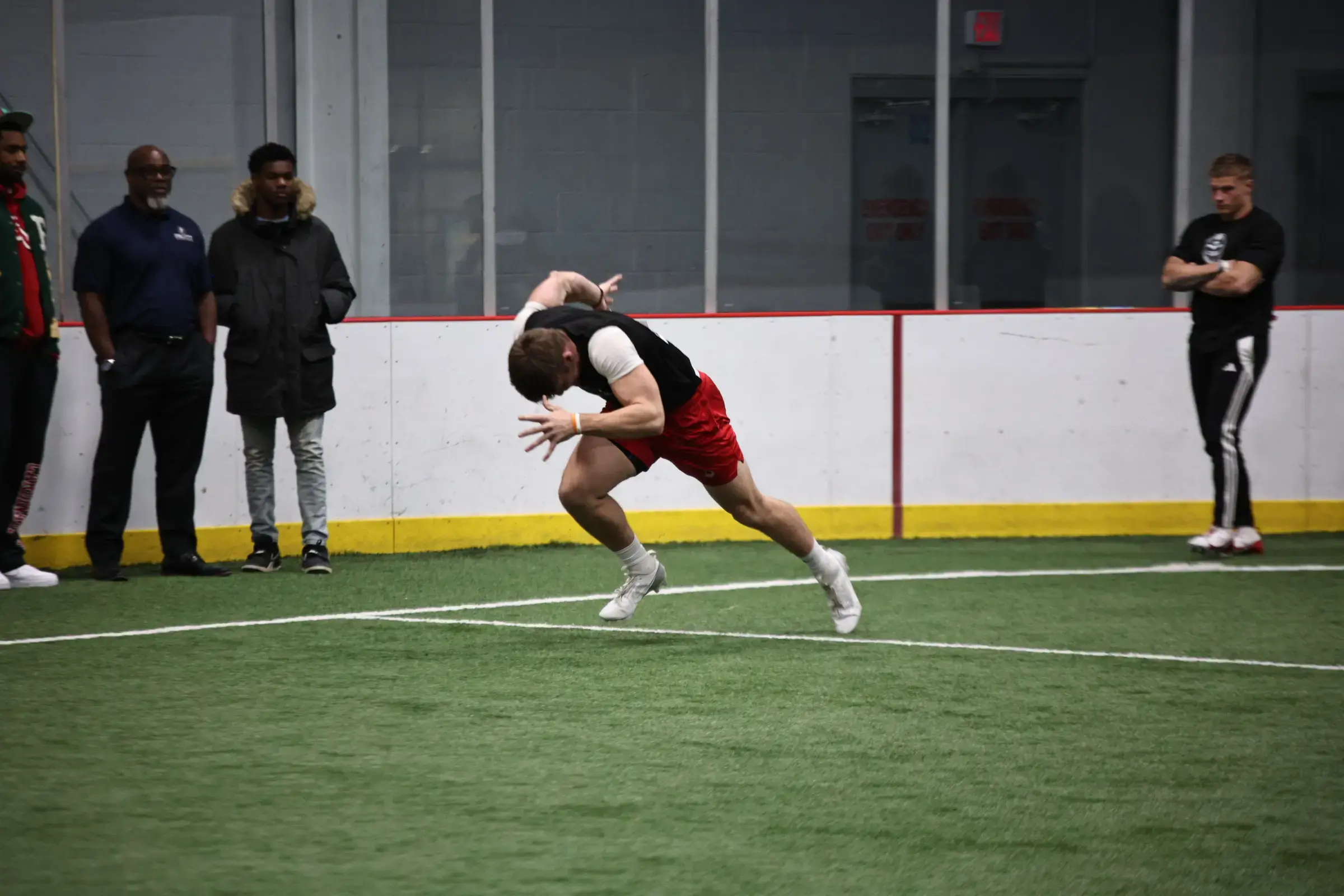 Michigan Arsenal player sprinting during an indoor practice drill